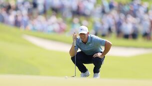 <p>Rory McIlroy lines up a putt on the seventh green during the second round of the BMW Championship at Bellerive Country Club in St Louis, Missouri. Picture: Alex Slitz/Getty Images</p>