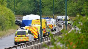 <p>Police officers at the scene of a fatal crash involving a police car and a Volkswagen Passat on the A66 in South Bank, near Middlesbrough. Picture: Owen Humphreys/PA Wire</p>