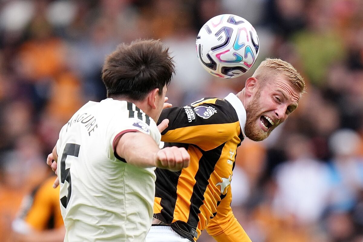 Manchester United's Harry Maguire (left) and Hull City's Oliver McBurnie battle for the ball. Pic: Annabel Lee-Ellis/PA Wire. Manchester United's Harry Maguire (left) and Hull City's Oliver McBurnie battle for the ball. Pic: Annabel Lee-Ellis/PA Wire.