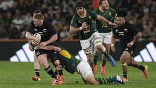 <p>New Zealand's prop Fletcher Newell is tackled during the Rugby's Greatest Rivalry international rugby union match between South Africa and New Zealand at Ellis Park Stadium in Johannesburg, on August 22, 2026. (Photo by GIANLUIGI GUERCIA / AFP via Getty Images)</p>
