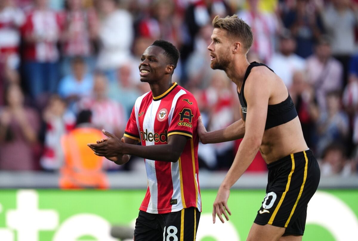 Brentford's Mamadou Sangare (left) and Kristoffer Ajer applaud the fans. Pic: John Walton/PA Wire. Brentford's Mamadou Sangare (left) and Kristoffer Ajer applaud the fans. Pic: John Walton/PA Wire.