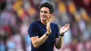 <p>Brentford manager Keith Andrews acknowledges the fans following the victory. </p>