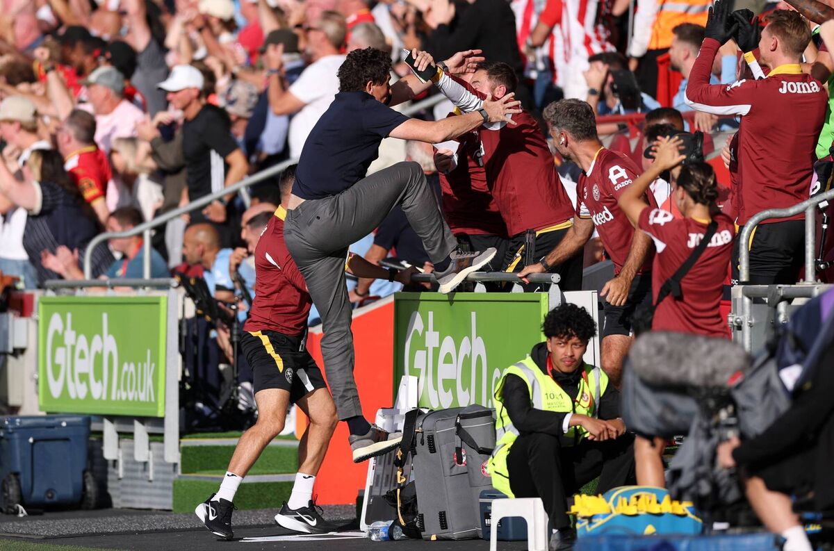Brentford manager Keith Andrews celebrates with his coaching staff after the team's second goal against Spurs. Pic: Ryan Pierse/Getty Images Brentford manager Keith Andrews celebrates with his coaching staff after the team's second goal against Spurs. Pic: Ryan Pierse/Getty Images