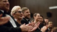 Spectators clapping in the theater, close up of hands
