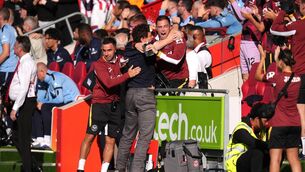 <p>BEES BUZZING: Brentford manager Keith Andrews celebrates with his coaching staff. Pic: John Walton/PA Wire.</p> <p>BEES BUZZING: Brentford manager Keith Andrews celebrates with his coaching staff. Pic: John Walton/PA Wire.</p>