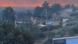 <p>The Hawk Fire began on Saturday and grew to more than 23 square miles as it spread on Sunday (Cari Kieffer via AP)</p>