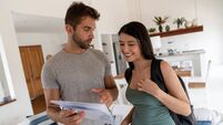 House sharing host explaining the house rules to a happy guest