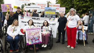 <p>Emily Felix, Emma O’Shea and Niamh Ni Hoireabhaird with Friedreich's Ataxia join the campaign to protest in Dublin to push for Skyclarys approval in Ireland. File picture: Sam Boal/Collins Photos</p>