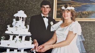 <p>Máire Uí Rabhartaigh and her husband Martin on their wedding day on June 25, 1988.</p>