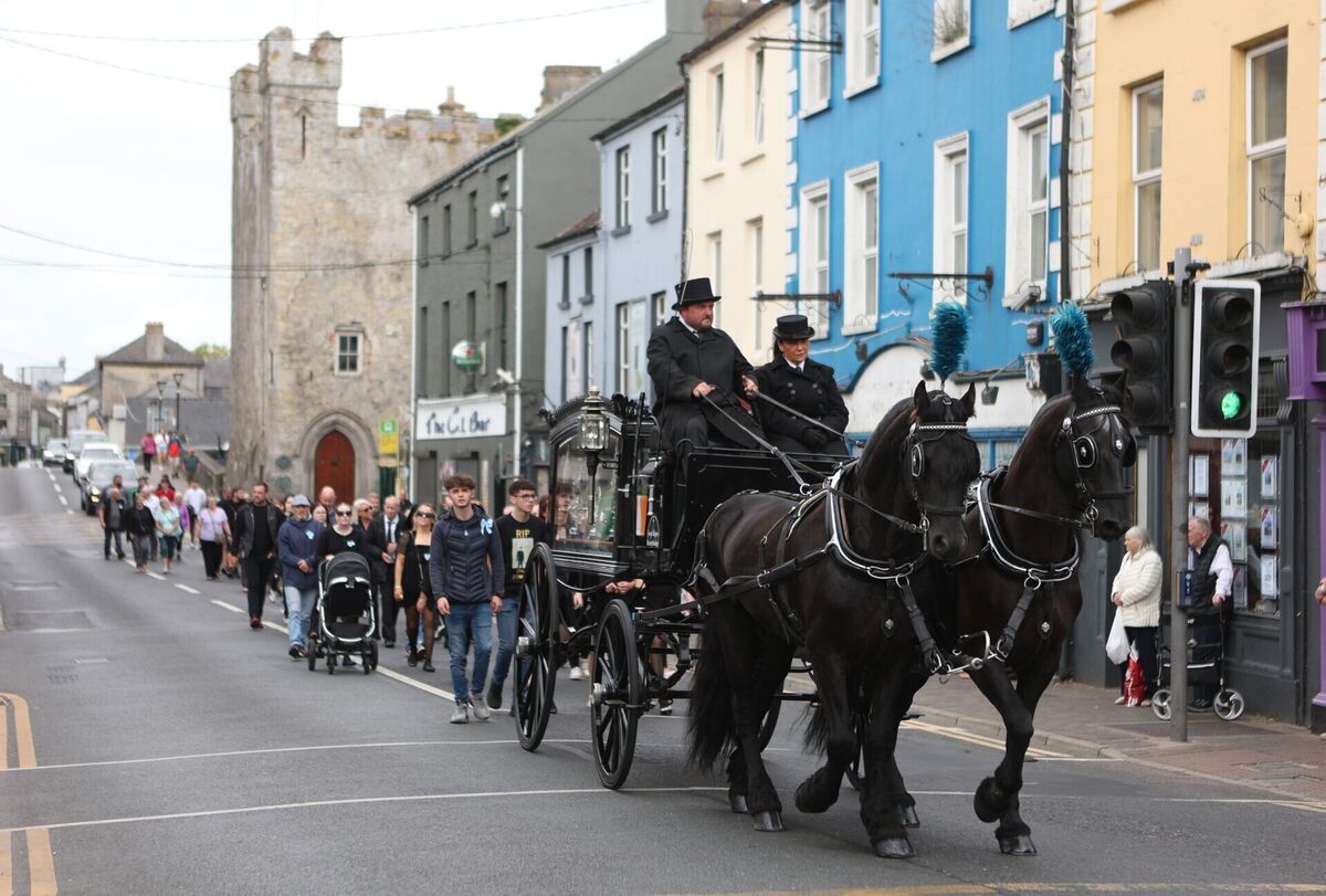 The cortege for Jack Kennedy makes its way through Athy, Co Kildare, ahead of his funeral at St Michael's Parish Church in the town. Jack was one of the five teenagers who died in a motorway crash in Co Kildare earlier this month. Photo: Evan Treacy/PA Wire The cortege for Jack Kennedy makes its way through Athy, Co Kildare, ahead of his funeral at St Michael's Parish Church in the town. Jack was one of the five teenagers who died in a motorway crash in Co Kildare earlier this month. Photo: Evan Treacy/PA Wire