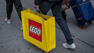 <p>A shopper carries a Lego bag. Picture: Victor J. Blue/Bloomberg</p> <p>A shopper carries a Lego bag. Picture: Victor J. Blue/Bloomberg</p>