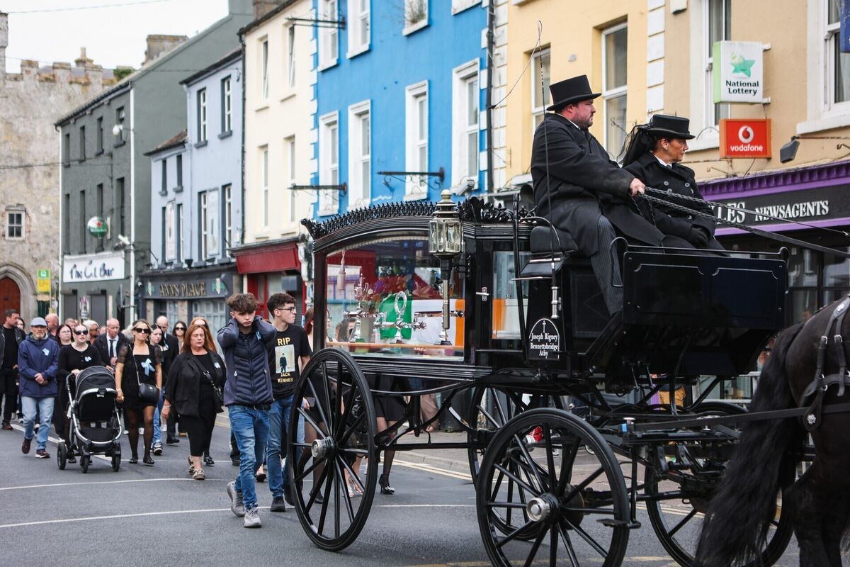 The cortege for Jack Kennedy makes its way through Athy, Co Kildare, ahead of his funeral at St. Michael's Parish Church in the town. Picture: Evan Treacy/PA The cortege for Jack Kennedy makes its way through Athy, Co Kildare, ahead of his funeral at St. Michael's Parish Church in the town. Picture: Evan Treacy/PA