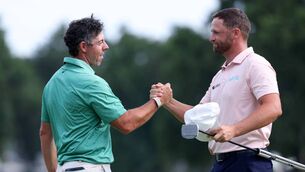 <p>Wyndham Clark is congratulated  by Rory McIlroy after winning the BMW Championship at Bellerive Country Club last Sunday. Pic: Kevin C Cox/Getty Images</p>