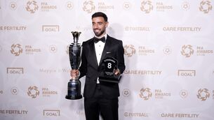 <p>Bruno Fernandes with his PFA players player of the year award. Pic: Peter Byrne/PA Wire.</p>