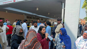 Grief-stricken relatives appeared outside the hospital (AP) Grief-stricken relatives appeared outside the hospital (AP)