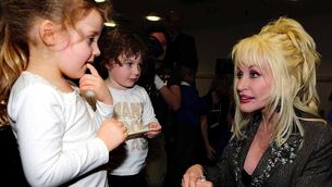 <p>The ‘Dolly Parton’s Imagination Library’ provides age-appropriate books tailored to individual children aged from birth to five years old, with one book sent each month. Picture: Rui Vieira/PA Wire</p>