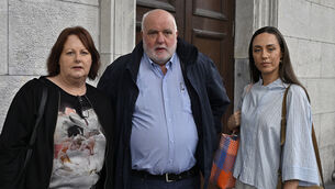 <p>Nora, Liam, and Rachel McCarthy at Cork courthouse for the inquest into the death of their son Eoin. Picture: Martin Walsh</p>