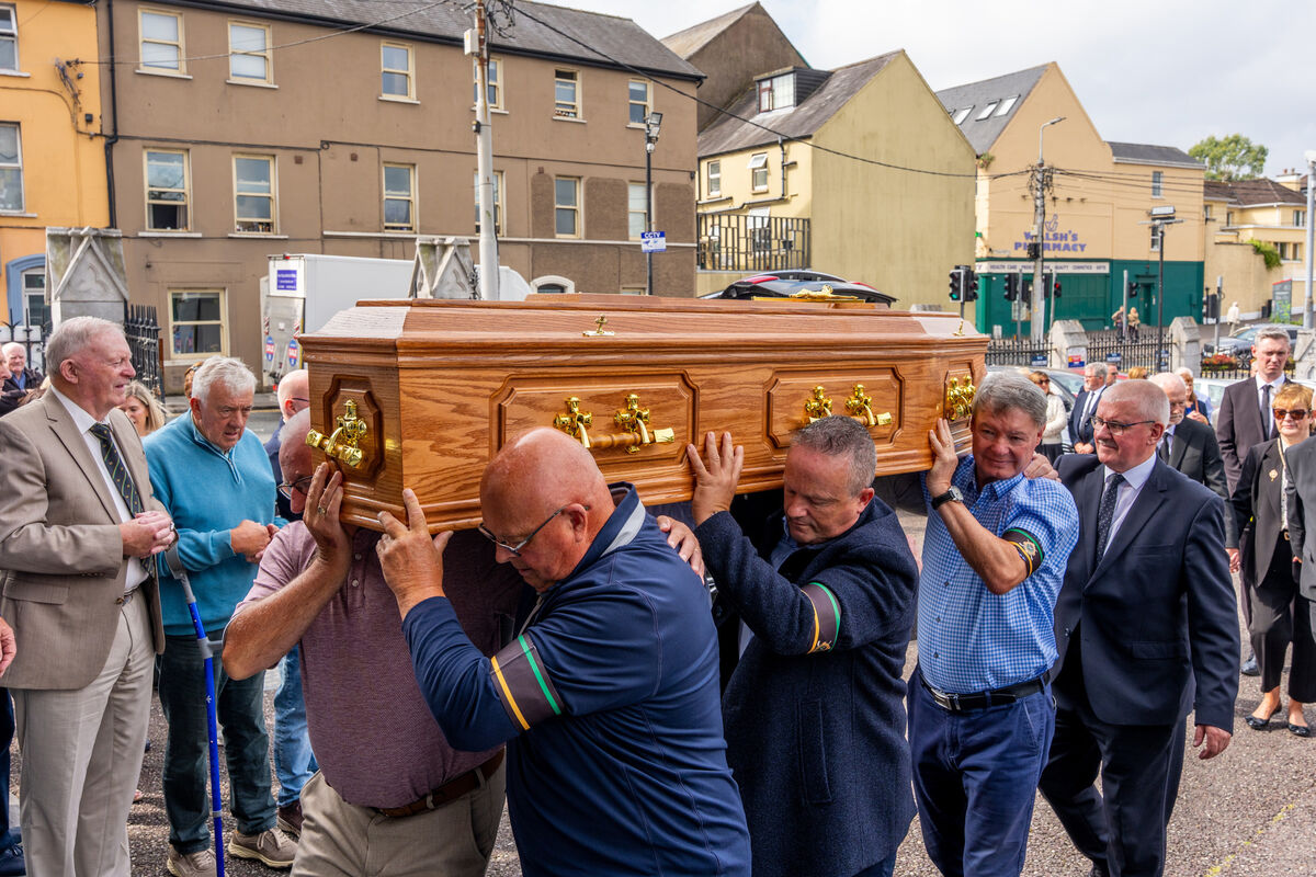 The coffin of Cork GAA legend Jimmy Lynam carried into the North Cathedral. Pic: Noel Sweeney