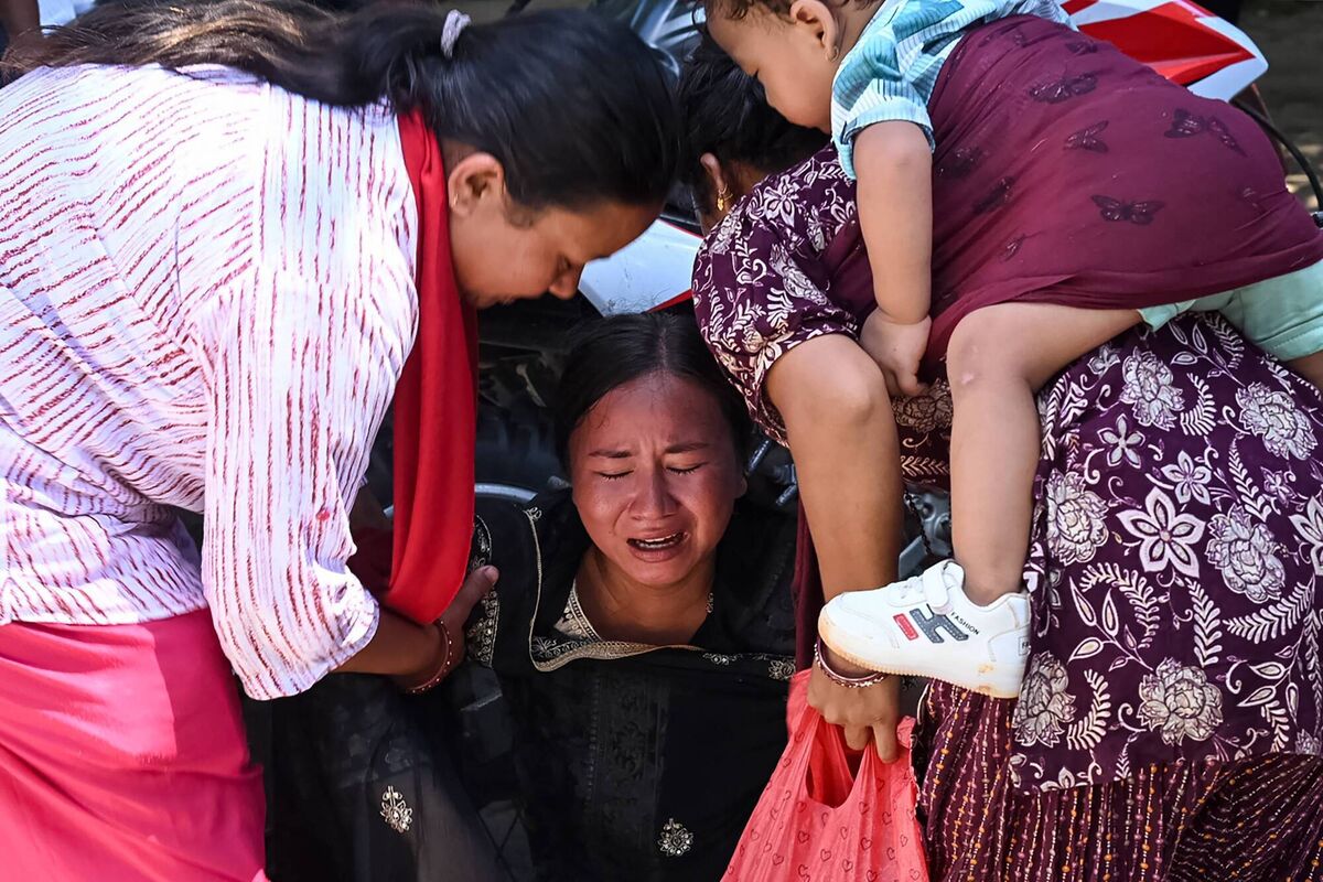 A woman breaks down as she waits for relatives to arrive at an army camp after being rescued from flash flood-affected areas, in Battar Bazar town in Nepal's Nuwakot district on August 27, 2026. (Photo by Prakash MATHEMA / AFP via Getty Images) A woman breaks down as she waits for relatives to arrive at an army camp after being rescued from flash flood-affected areas, in Battar Bazar town in Nepal's Nuwakot district on August 27, 2026. (Photo by Prakash MATHEMA / AFP via Getty Images)