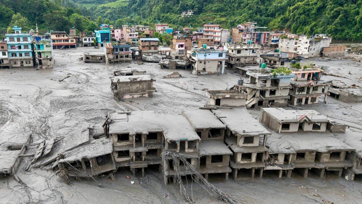 An aerial view shows houses lying deluged in sludge after flash floods at Devighat, Bidur Municipality in Nepal's Nuwakot district on August 27, 2026. (Photo by Prabin RANABHAT / AFP via Getty Images) An aerial view shows houses lying deluged in sludge after flash floods at Devighat, Bidur Municipality in Nepal's Nuwakot district on August 27, 2026. (Photo by Prabin RANABHAT / AFP via Getty Images)
