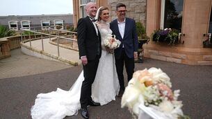 <p>British prime minister Andy Burnham meets bride and groom Conor, from Belfast and Kira, from Liverpool, Rosato, as he arrives at the Culloden Hotel, Belfast, during his first visit to Northern Ireland Picture: Brian Lawless/PA Wire</p>