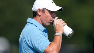<p>Rory McIlroy hydrates on the driving range in Atlanta. Pic: AP Photo/Mike Stewart</p> <p>Rory McIlroy hydrates on the driving range in Atlanta. Pic: AP Photo/Mike Stewart</p>