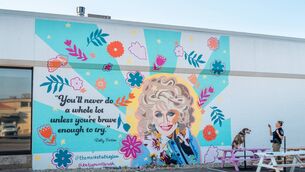 <p>Fort Worth police officer Kelly French and her K9 dog Wookie in front of a Dolly Parton mural in the Texas city this week, following the singer's death at age 80. Picture: Brandon Bell/Getty Images</p> <p>Fort Worth police officer Kelly French and her K9 dog Wookie in front of a Dolly Parton mural in the Texas city this week, following the singer's death at age 80. Picture: Brandon Bell/Getty Images</p>