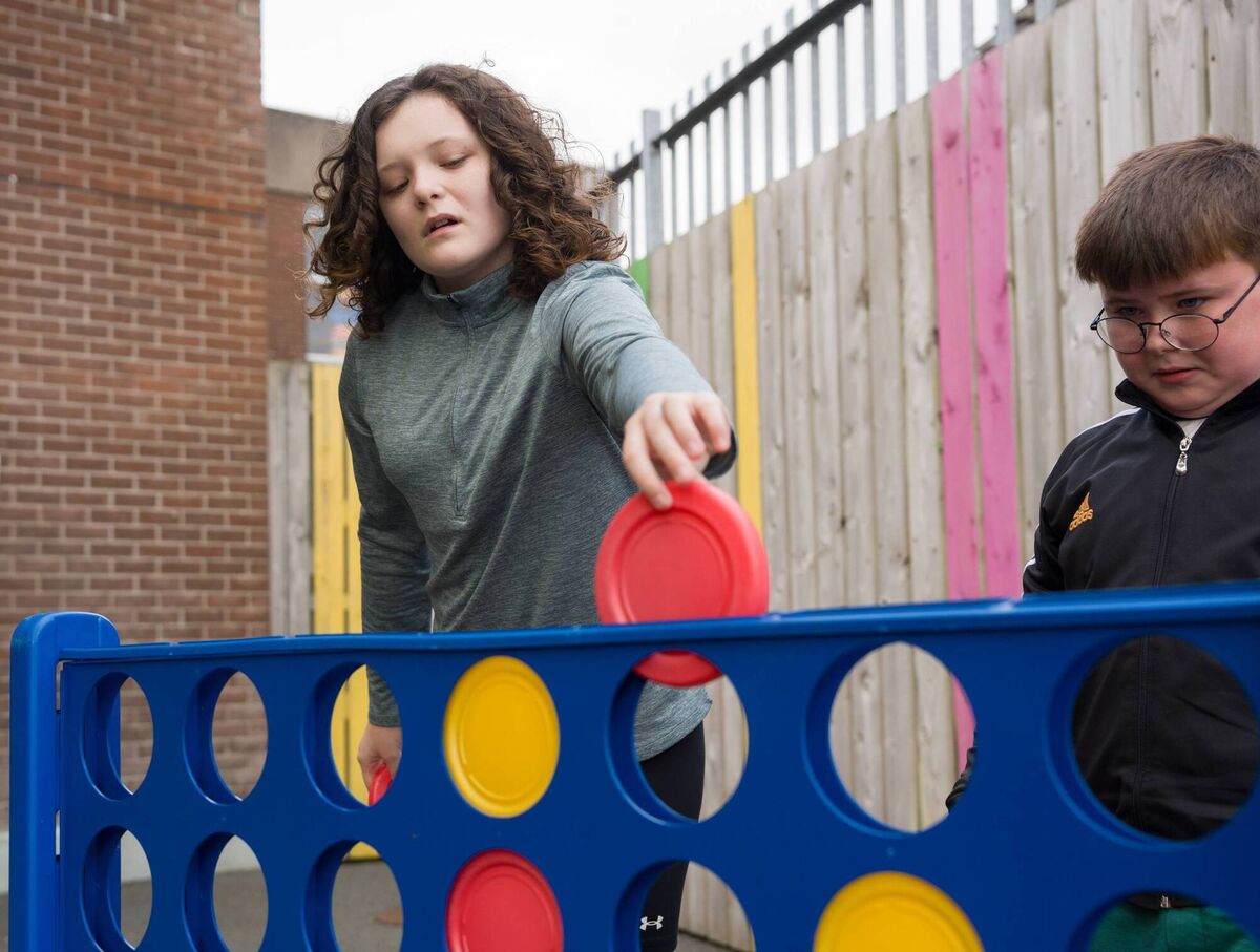 Lily and Darragh enjoying a fun game at the school Lily and Darragh enjoying a fun game at the school