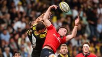 Ben O'Connor and Ugo Pacome compete in the air for the ball 28/8/2026