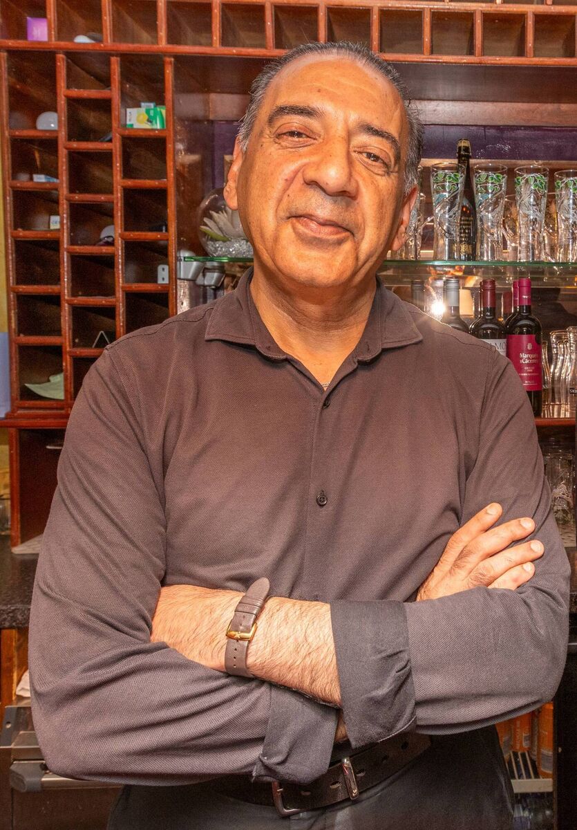 Shahzad Rashid was working when a 'river' rushed through his College St restaurant in Killarney. Picture: Neil Michael Shahzad Rashid was working when a 'river' rushed through his College St restaurant in Killarney. Picture: Neil Michael