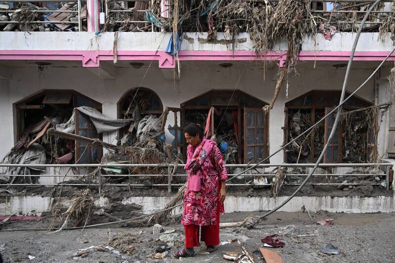 A woman salvages usable materials from her house deluged in sludge following flash floods at Devighat in Nepal's Nuwakot district on August 28, 2026. Picture: Arun SANKAR / AFP via Getty Images A woman salvages usable materials from her house deluged in sludge following flash floods at Devighat in Nepal's Nuwakot district on August 28, 2026. Picture: Arun SANKAR / AFP via Getty Images
