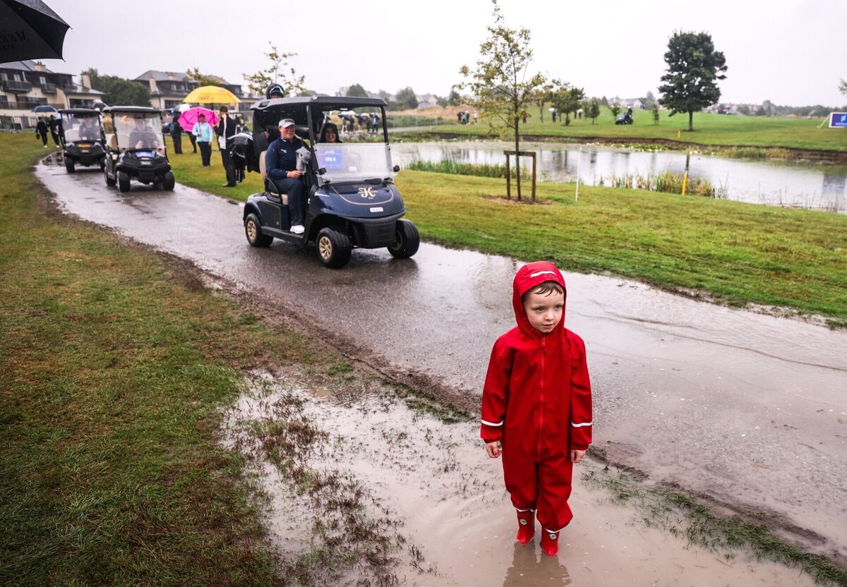 Jarlath Carry, age four, from Meath, during the wet conditions. Pic: INPHO/Tom Maher Jarlath Carry, age four, from Meath, during the wet conditions. Pic: INPHO/Tom Maher