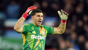 <p>Emiliano Martinez reacts during the Champions League round of sixteen second-leg.</p> <p>Emiliano Martinez reacts during the Champions League round of sixteen second-leg.</p>