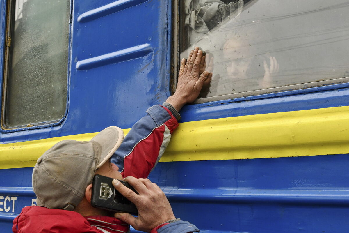 Those staying behind in Ukraine saying goodbye to refugees fleeing the Russian attacks in 2022. Picture: Andriy Andriyenko/AP Those staying behind in Ukraine saying goodbye to refugees fleeing the Russian attacks in 2022. Picture: Andriy Andriyenko/AP