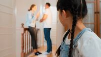 Stressed and unhappy young girl hide from domestic violence at home. Synchronos