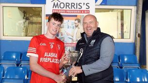 <p>Brendan Breen was in Fraher Field on Monday night to see Stradbally U16 hurlers win the Division 1A trophy and present the trophy to the winning Stradbally captain Gearóid Power.</p> <p>Brendan Breen was in Fraher Field on Monday night to see Stradbally U16 hurlers win the Division 1A trophy and present the trophy to the winning Stradbally captain Gearóid Power.</p>