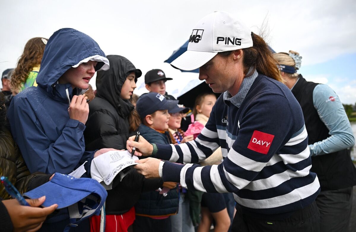 Leona Maguire signs a hat for a spectator. Pic: Seb Daly/Sportsfile Leona Maguire signs a hat for a spectator. Pic: Seb Daly/Sportsfile