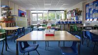 Empty Tables And Chairs In Primary Or Elementary School Classroom