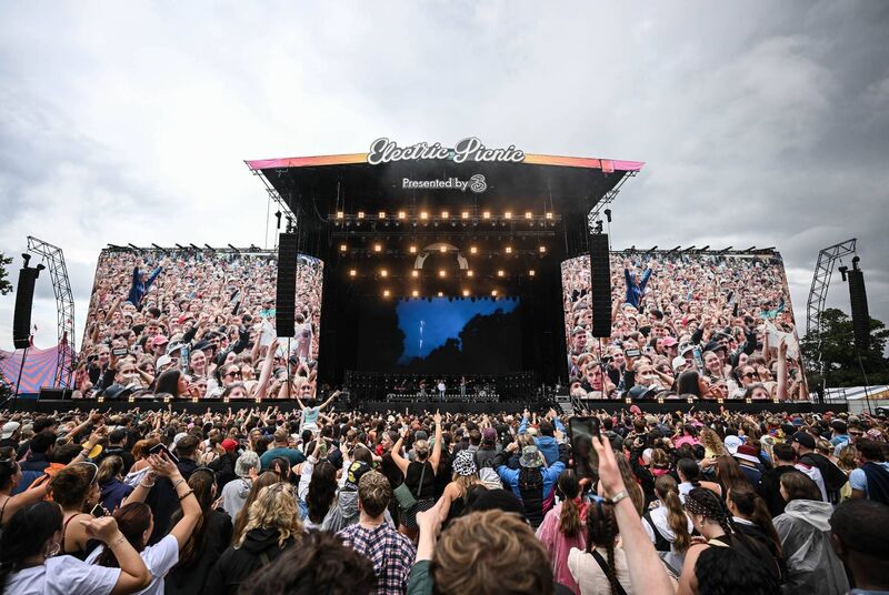 Role Model in full flight on the main stage — with the packed crowd captured on the stage-side screens — during his set at Electric Picnic in Stradbally, Co Laois. 	Picture: Ramsey Cardy