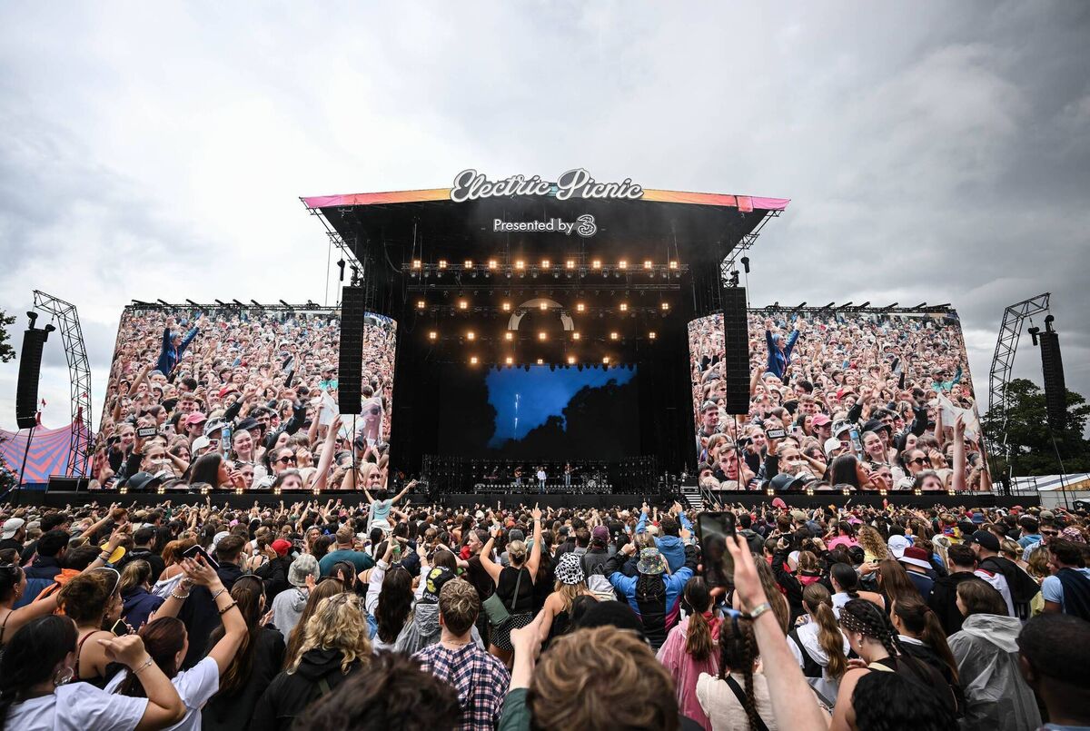 Role Model in full flight on the main stage — with the packed crowd captured on the stage-side screens — during his set at Electric Picnic in Stradbally, Co Laois. 	Picture: Ramsey Cardy