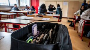 <p>A suitcase containing students' mobile phones, set aside during classes at the Jean Mermoz vocational high school in Montsoult, Paris. File picture: Bertrand Guay/Getty Images</p>