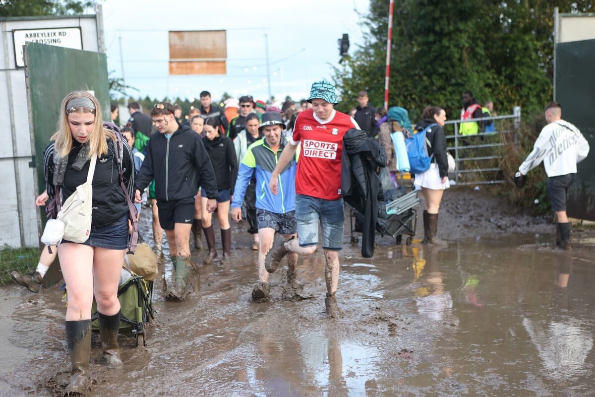 Festivalgoers negotiate the mud during the Electric Picnic. Picture: Evan Treacy/PA Wire Festivalgoers negotiate the mud during the Electric Picnic. Picture: Evan Treacy/PA Wire