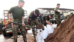 <p>Soldiers from 1 Brigade Signals at the Cork County Council depot filling and delivering sandbags to protect against further flooding in Midleton Co. Cork on October 20, 2023. Picture: Larry Cummins</p> <p>Soldiers from 1 Brigade Signals at the Cork County Council depot filling and delivering sandbags to protect against further flooding in Midleton Co. Cork on October 20, 2023. Picture: Larry Cummins</p>