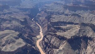 <p>At least two people have died, nearly 80 people were rescued, and one remains unaccounted for after a surge of water and debris swept through the Grand Canyon on Saturday. Picture: (Craig Sanderson via AP)</p> <p>At least two people have died, nearly 80 people were rescued, and one remains unaccounted for after a surge of water and debris swept through the Grand Canyon on Saturday. Picture: (Craig Sanderson via AP)</p>