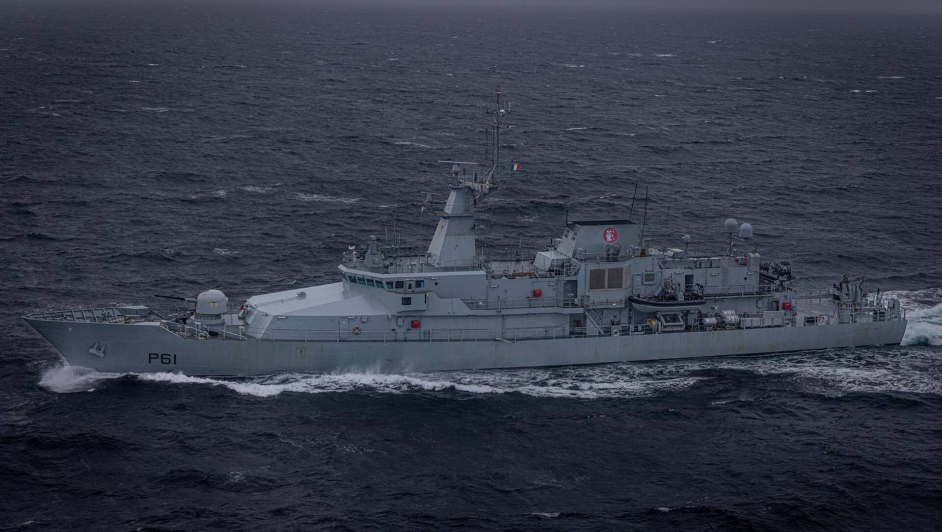 The Irish Naval Service patrol vessel LÉ Samuel Beckett could be seen patrolling off the coast, supported by a British Royal Navy warship positioned outside Irish territorial waters. File picture