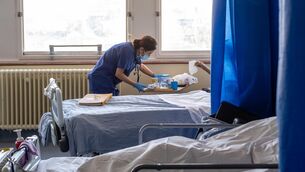 <p>Staff on a hospital ward (Jeff Moore/PA)</p>