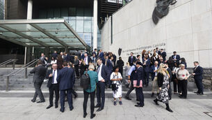 <p>In Dublin, around 100 criminal defence solicitors walked out of the district court at the Criminal Courts of Justice on Tuesday in protest over the changes by justice minister Jim O’Callaghan. Photo: Sam Boal/Collins photos</p>