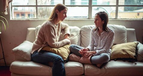 Mother and daughter talking