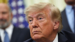 President Donald Trump listens as a reporter asks a question in the Oval Office of the White House (Jacquelyn Martin/AP) President Donald Trump listens as a reporter asks a question in the Oval Office of the White House (Jacquelyn Martin/AP)
