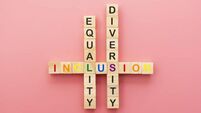 Inclusion, diversity and equality concept. Lgbtq abstract letters on wooden cubes over pink background.